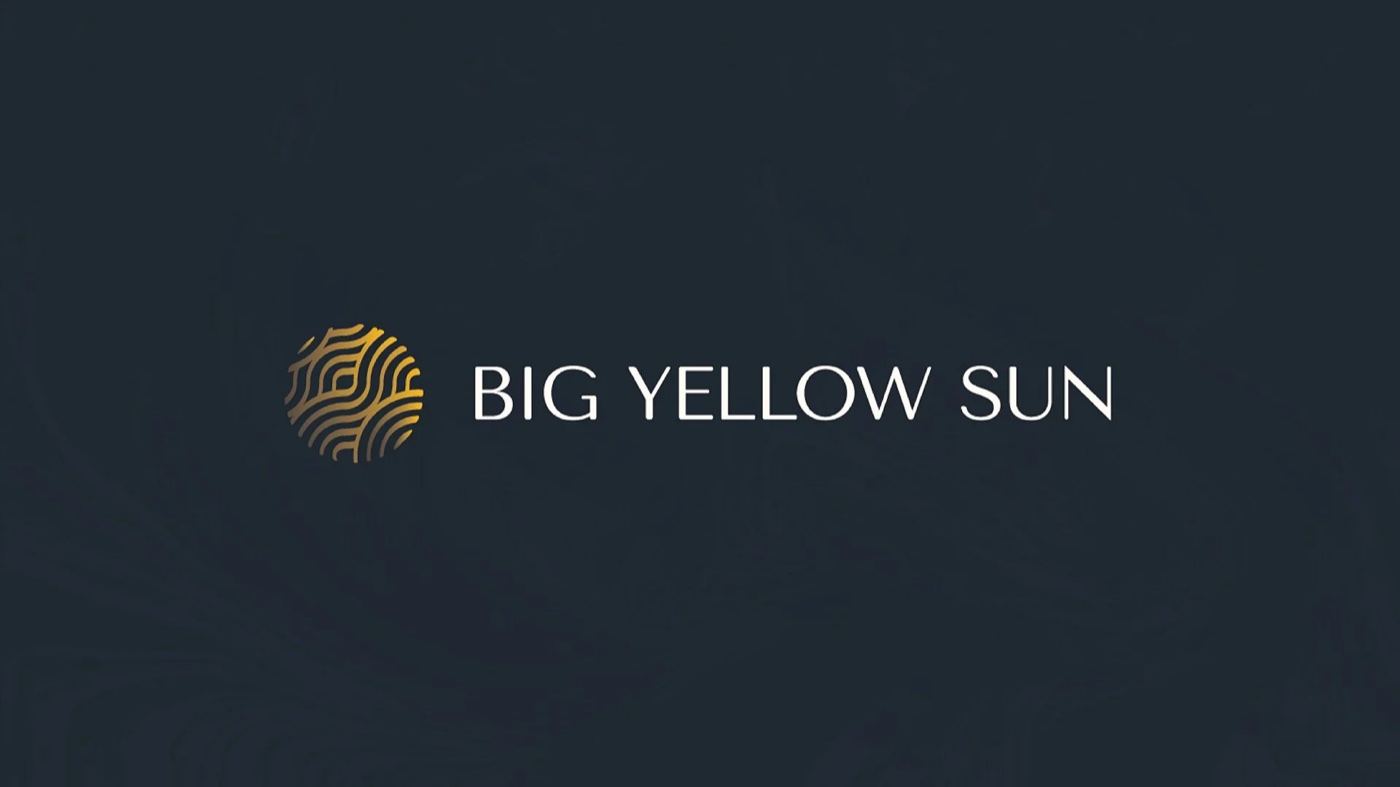 The Big Yellow Sun wordmark and sun mark on navy