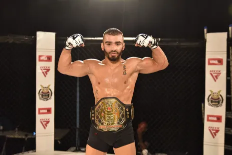 Shogun MMA fighter portrait, championship belt
