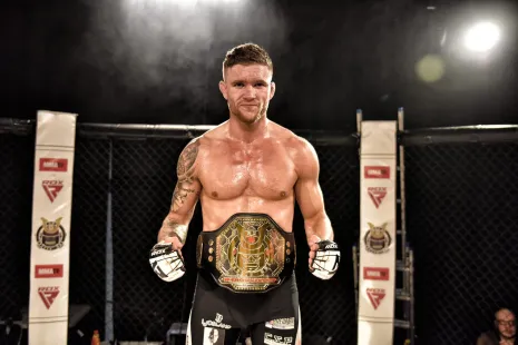 Shogun MMA fighter portrait, championship belt